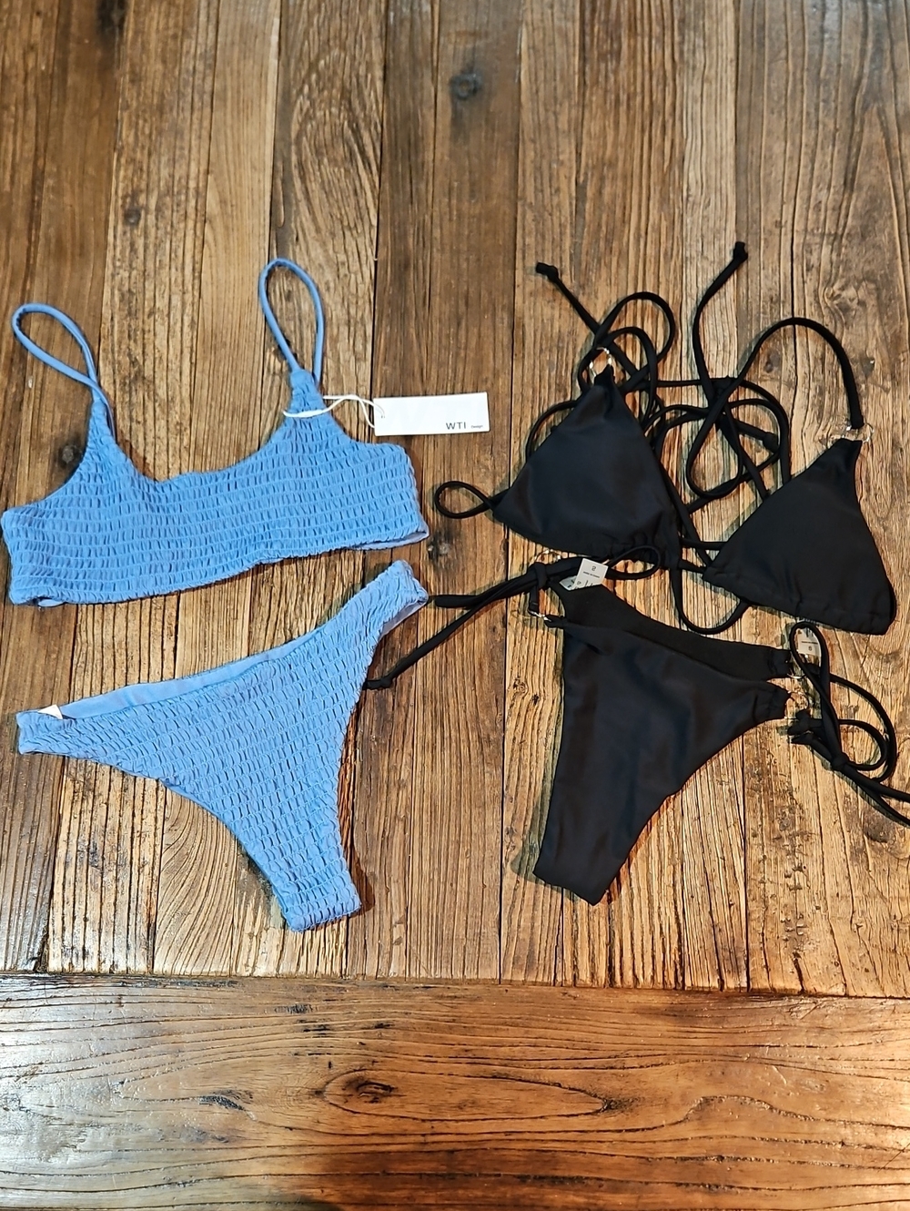 Bundle of 2 Bikinis Size S: NWT WTI Blue Smocked & Black String Swimsuits